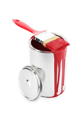 Can of red paint and brush isolated on white
