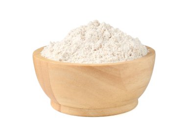 Beyaz kasedeki kahverengi pirinç unu.