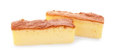Pieces of tasty Japanese Castella sponge cake isolated on white