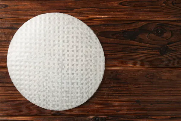 Ahşap masa üzerinde yenilebilir kağıt çarşaf yığını, üst manzara. Metin için boşluk