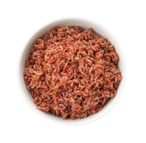 Lezzetli kahverengi pirinç kasede, beyaz manzarada izole edilmiş.