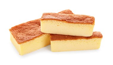Pieces of tasty Japanese Castella sponge cake isolated on white