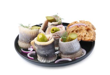 Zeytinli, turşulu, dereotlu, soğanlı ve ekmekleri beyaza sarılmış lezzetli ringa balıkları.