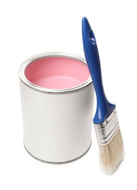 Can of pink paint and brush isolated on white
