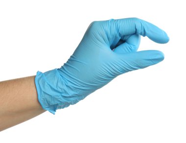 Tıbbi eldivenli doktor beyaz arka planda bir şey tutuyor.