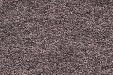 Arka plan olarak kahverengi örülmüş kumaşın dokusu, üst görünüm