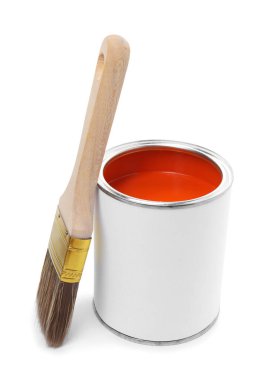 Can of orange paint and brush isolated on white