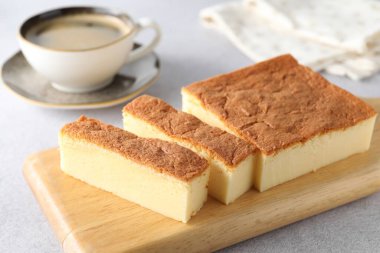Tasty Japanese Castella sponge cake served on light table, closeup