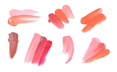 Beyaz arka planda farklı tonlarda sıvı ruj örnekleri, üst manzara. Örnek kümesi