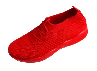 Bir kırmızı spor ayakkabı beyaz havada izole edilmiş.