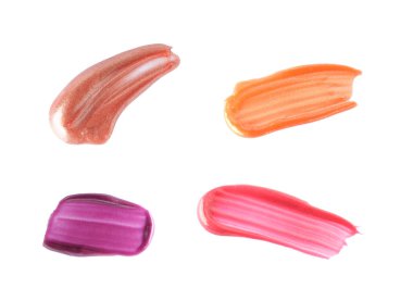 Beyaz arka planda farklı tonlarda sıvı ruj örnekleri, üst manzara. Örnek kümesi