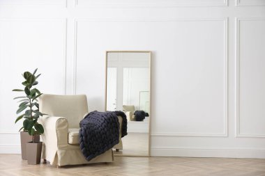 Odadaki koltukta örülmüş merino yün ekose kumaş. Metin için boşluk