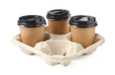 Paper coffee cups in cardboard holder isolated on white