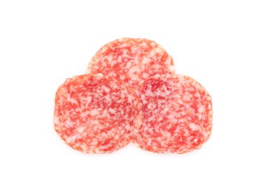 Slices of tasty smoked sausage on white background, top view