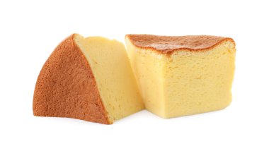 Pieces of tasty Japanese Castella sponge cake isolated on white
