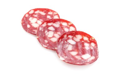 Slices of tasty smoked sausage on white background