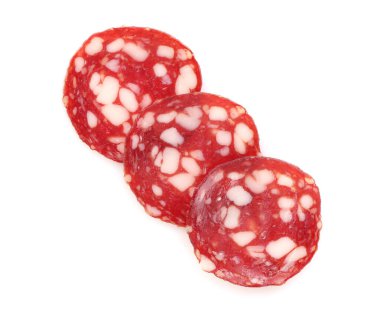 Slices of tasty smoked sausage on white background, top view