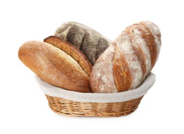 Sepetteki farklı somunlar beyaza izole edilmiş.