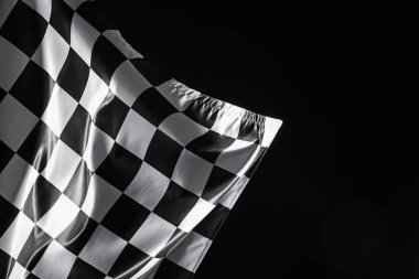 Siyah arkaplanda bir yarış bayrağı, metin için boşluk