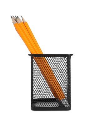 Many pencils in holder isolated on white