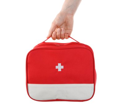 Beyaz arka planda kadın ilk yardım çantası, yakın plan.