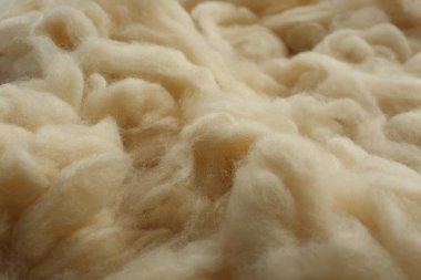 Arkaplan olarak yumuşak beyaz yün dokusu, yakın plan