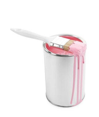 Can of pink paint and brush isolated on white