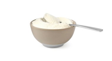 Kasedeki kolajen tozu ve beyaza izole edilmiş kaşık.