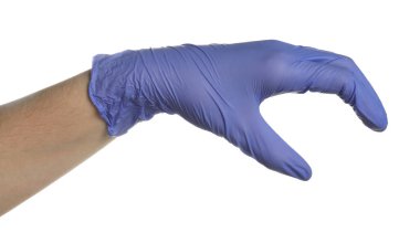 Tıbbi eldivenli doktor beyaz arka planda bir şey tutuyor.