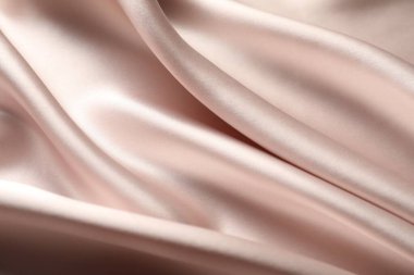 Arkaplan olarak bej buruşuk ipek kumaş, üst görünüm