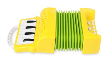 Oyuncak akordeon beyazda izole edildi. Çocukların müzik aleti.