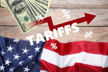 Vergi zammı. Dolar ve Amerikan bayrağı ahşap masanın üstünde.