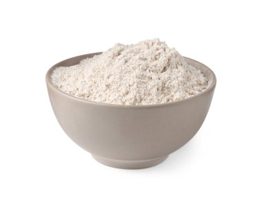 Beyaz kasedeki kahverengi pirinç unu.