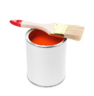 Can of orange paint and brush isolated on white