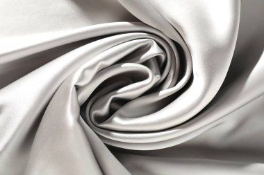 Arkaplan olarak gri buruşuk ipek kumaş, üst görünüm