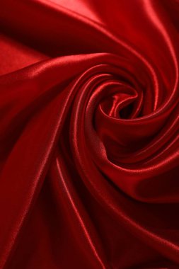 Arkaplan olarak kırmızı buruşuk ipek kumaş, üst görünüm