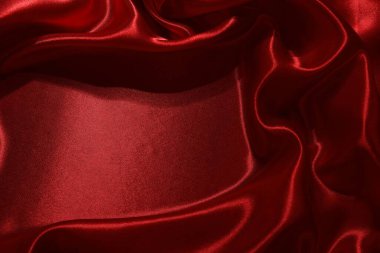 Arkaplan olarak kırmızı buruşmuş ipek kumaş, üst görünüm