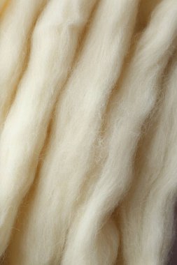 Arkaplan olarak yumuşak beyaz yün dokusu, yakın plan
