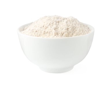 Beyaz kasedeki kahverengi pirinç unu.