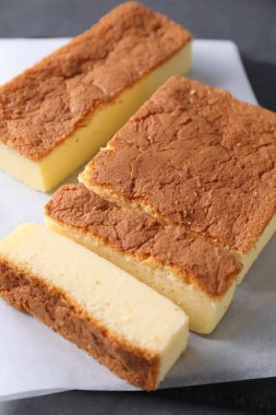Tasty Japanese Castella sponge cake on table, closeup