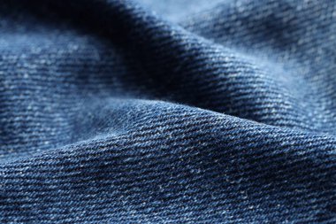 Arka plan olarak mavi kot kumaşın dokusu, yakın plan