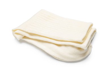 Beyaza izole edilmiş bir çift bej çorap.