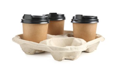 Paper coffee cups in cardboard holder isolated on white