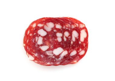 Slices of tasty smoked sausage on white background, top view