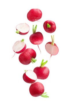 Fresh ripe radishes falling on white background