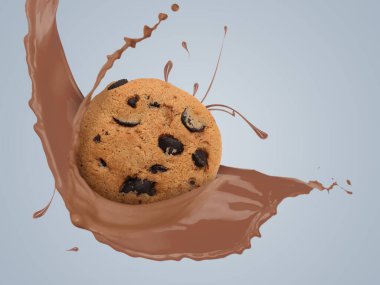 Çikolatalı süt akışı ve gri arka planda lezzetli kurabiyeler.