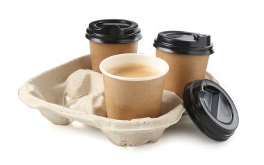 Paper coffee cups in cardboard holder isolated on white