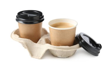 Paper coffee cups in cardboard holder isolated on white
