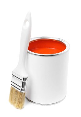 Can of orange paint and brush isolated on white