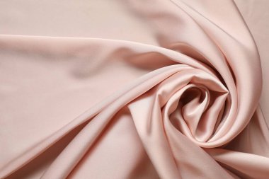 Pembe buruşuk ipek kumaş arka plan olarak, üst görünüm